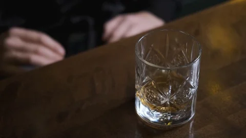 Drunk man knocking on table with his hands, anger,drinking alcohol Stock Footage 129802011