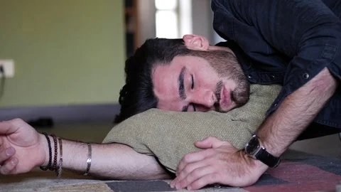 Drunk Man Resting on Couch with head on the Floor Stock Footage 81086241