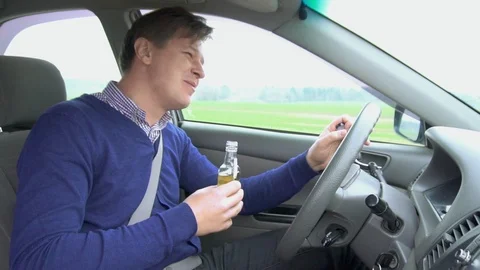 Drunk man at the wheel. Driving while intoxicated. Stock Footage 88650247