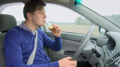 Drunk man at the wheel. Driving while intoxicated. Stock Footage 88650442