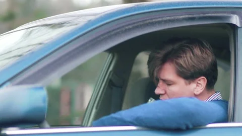 Drunk man at the wheel. Driving while intoxicated. Stock Footage 88785064