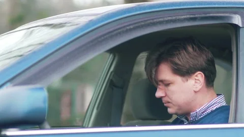 Drunk man at the wheel. Driving while intoxicated. Stock Footage 88785378