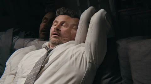 Drunk Middle Aged Businessman Drinking Alcohol with Double Vision Stock Footage 344855869