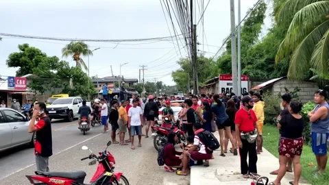 Drunk motorcyclist crashed into car, crowd gathered people Asia Philippines Stock-Footage 237635121