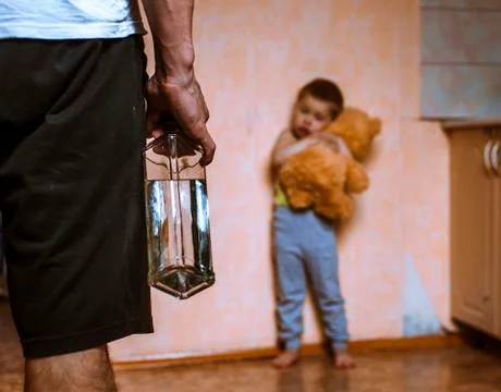 Drunk parent and scared child Stock Photos