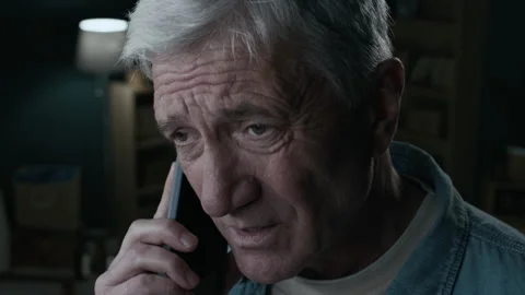 Drunk Senior Man Talking on Smartphone while Drinking Beer at Home Stock Footage 300604308