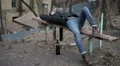 Drunk young guy lying on bench, alcohol abuse problem, hangover after party HD Footage