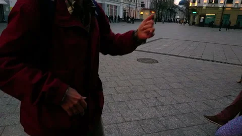 Drunken man waves his hands and tells about music Stock Footage 113324881
