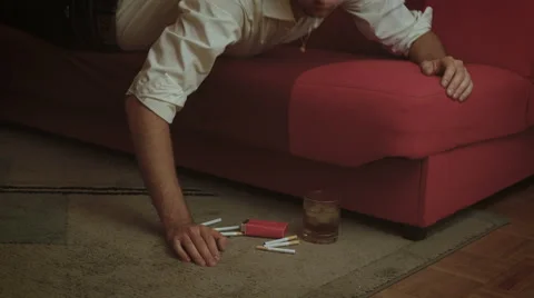 Drunken young businessman falls down from the couch 스톡 동영상 54643264