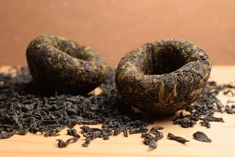 Dry and compressed tea Stock Photos