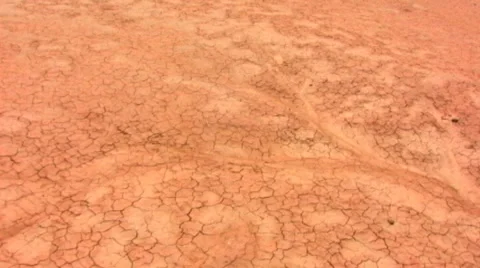 Dry And Cracked Desert Ground Stock Footage