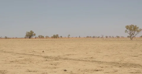 The dry and empty landscape of the arid country of the Australian Outback Stock Footage 125751442