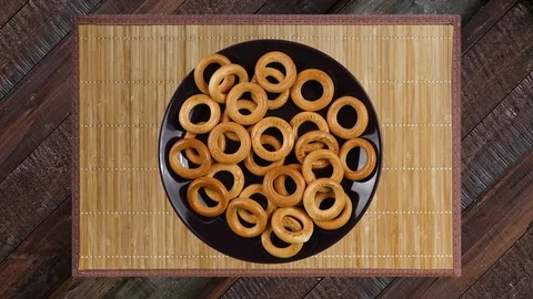 Dry bagels on the plate. 스톡 동영상 100036441