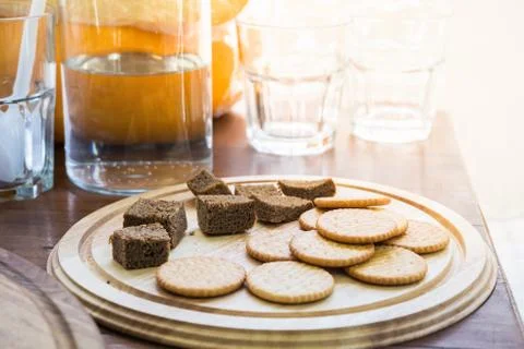Dry biscuits and corn bread as food sample. Biscuits and dark bread for degus Stock Photos