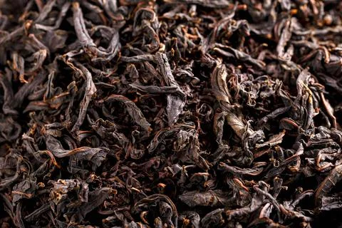 Dry Black large leaf tea. Background, texture Stock Photos