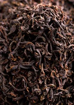 Dry Black large leaf tea. Background, texture Stock Photos