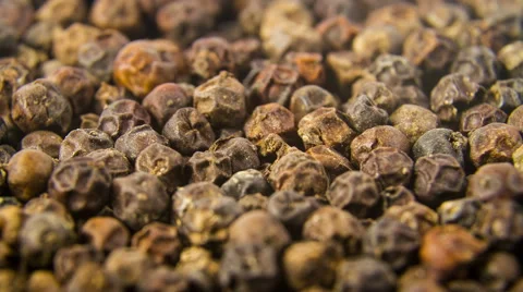 Dry black pepper close up rotation 4K Stock Footage 48014228