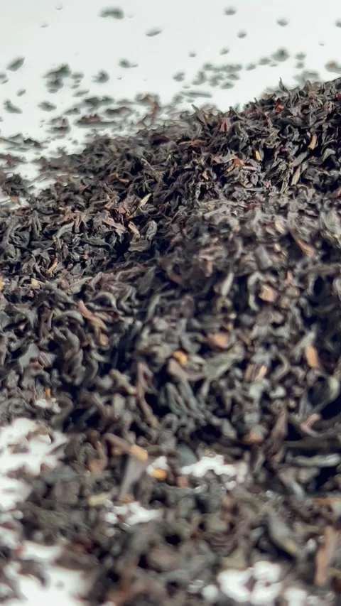 Dry black tea leaves close-up, premium quality product Stock Footage 336471307
