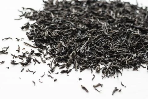 Dry black tea leaves Stock Photos