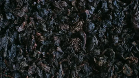 Dry black tea leaves rotating macro view Stock-Footage 337830715