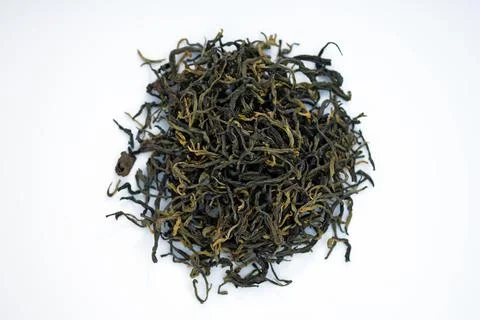 Dry black tea without additives close-up. Stock Photos
