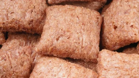 Dry breakfast. Chocolate pillows close-up. The pads are stuffed . Cocoa with Stock Footage 140930583