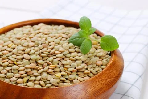 Dry brown lentils Stock Photos