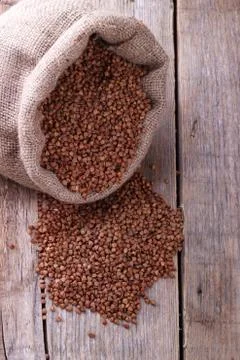 Dry buckwheat in a sack Stock Photos