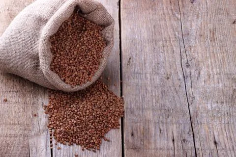 Dry buckwheat in a sack Stock Photos