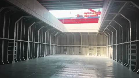 Dry cargo hold view from inside. hold is cleaned and prepared for loading grain Stock Footage 274985170