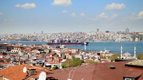 Dry cargo sails across the Bosphorus strait in Istanbul, Turkey Stock Footage 316894367