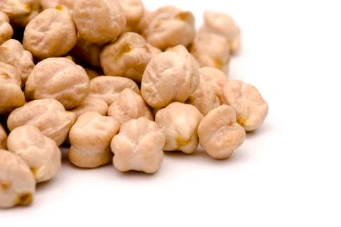 Dry Chickpeas on a White Background Stock Photos