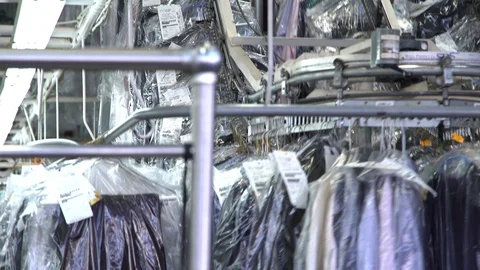Dry Cleaner Conveyor System Tracking Stock Footage 103625600