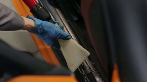 Dry cleaning of a cabriolet .The Master vacuum cleaner car interior. Stock Footage 76354669