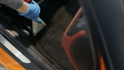 Dry cleaning of a cabriolet .The Master vacuum cleaner car interior. Stock Footage 76354787