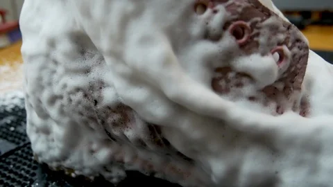 Dry cleaning shoes when using steam 動画素材 123671753
