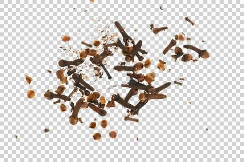 Dry clove buds falling creating a spice background Stock Photos