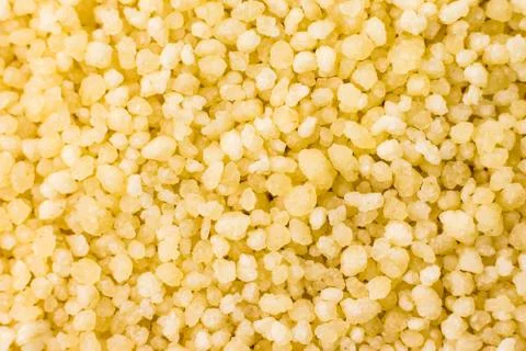 Dry couscous background Stock Photos