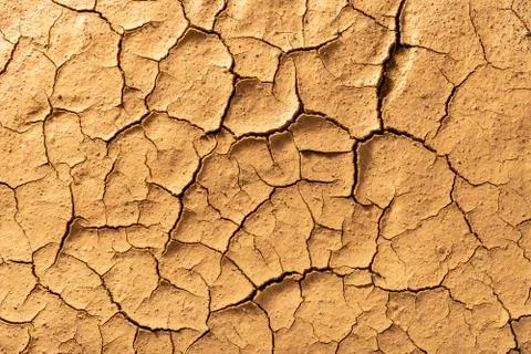 Dry cracked clay texture. Consequences of global warming. Climate change Stock Photos