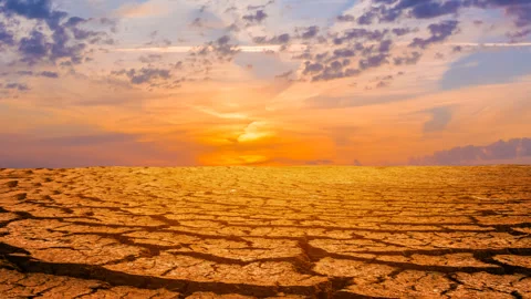 Dry cracked earth at the dramatic sunset time lapse scene Stock Footage 301086046