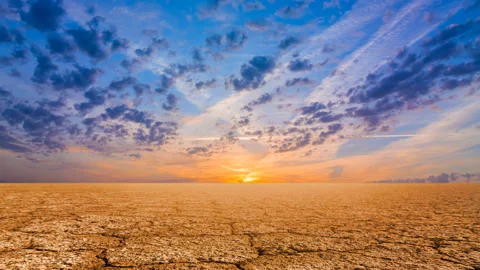 Dry cracked earth at the sunset Stock Footage 142231264