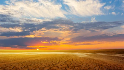 Dry cracked earth at the sunset Stock Footage 149660805