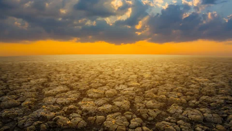 Dry cracked earth at the sunset Stock Footage 249651008