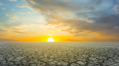 Dry cracked saline land at the dramatic sunset Stock Footage 146690547