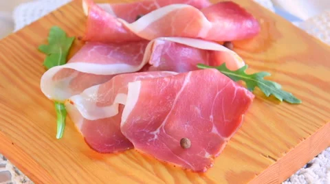 Dry-cured ham rotating on platte Stock Footage 59783148