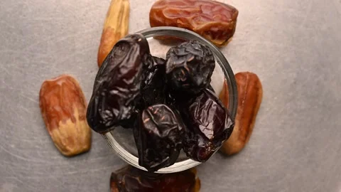 Dry Dates in Bowl Rotating Top View, Sweet date Fruit Stock Footage 328388188