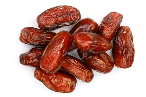 Dry dates isolated on white background. Top view. Flat lay pattern Stock Photos