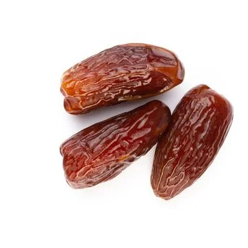 Dry dates isolated on white background. Top view. Flat lay pattern. Stock Photos
