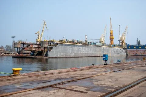 Dry Dock with Cranes at a Shipyard Stock Photos