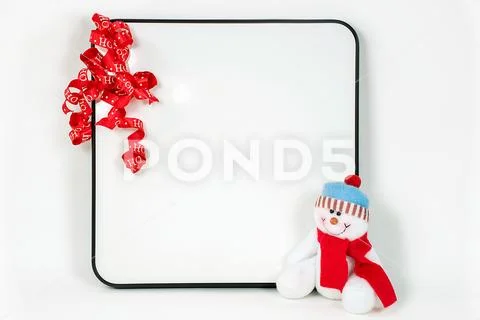 Dry erase board with Christmas ribbon Stock Photos